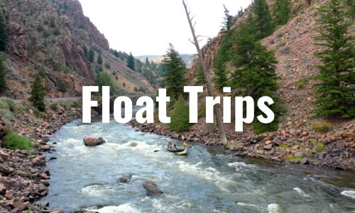 anglers in a drift boat float down the upper Colorado River while fly fishing for trout